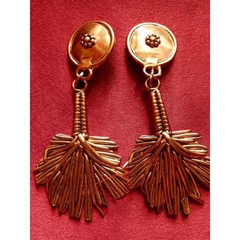 Boucles d'oreilles Yves Saint Laurent .